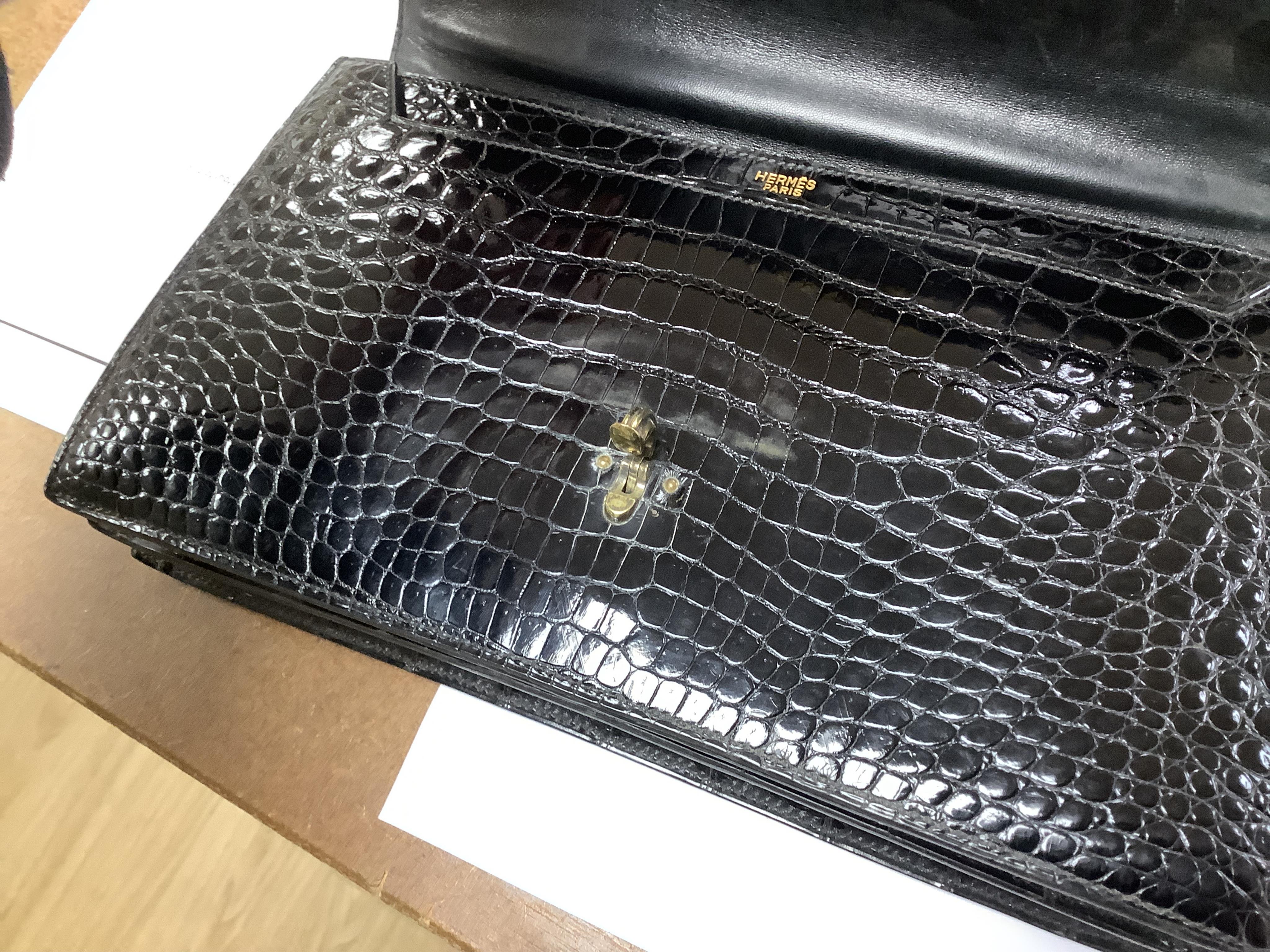 A Hermès vintage Cordeliere black crocodile handbag, height 16.5cm, top of handle 31cm, width 27.5cm, depth 5cm